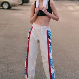 Stylish Women's Sweatpants with Blue Floral Accents
New but no tags size small